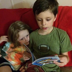 Reading a Scholastic Branches book together before bed.